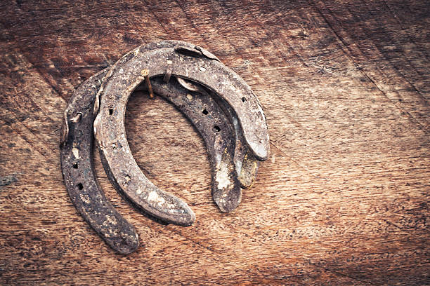 istock old horseshoe on wood for vintage style 519702941