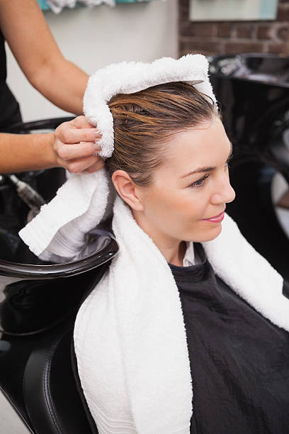 istock Customer getting their hair dried 519703559