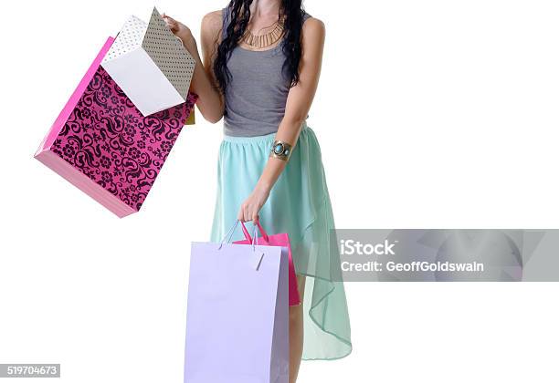 Close Up Of Shopper Girl Holding Purchases Isolated On White Stock Photo - Download Image Now