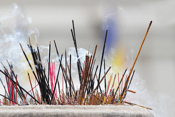 istock Dalada Maligawa Kandy temple  smoking insense sticks Sri Lanka 519704760