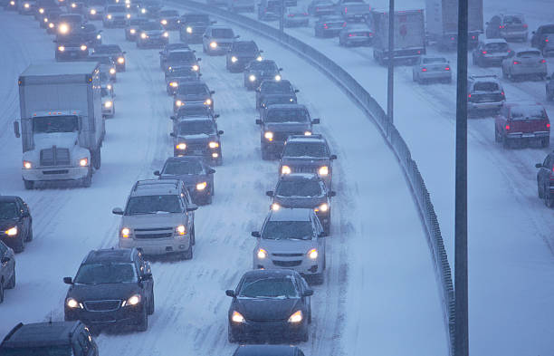 istock Winter Traffic Jam on Highway During a Midwest Snowstorm. 519704973