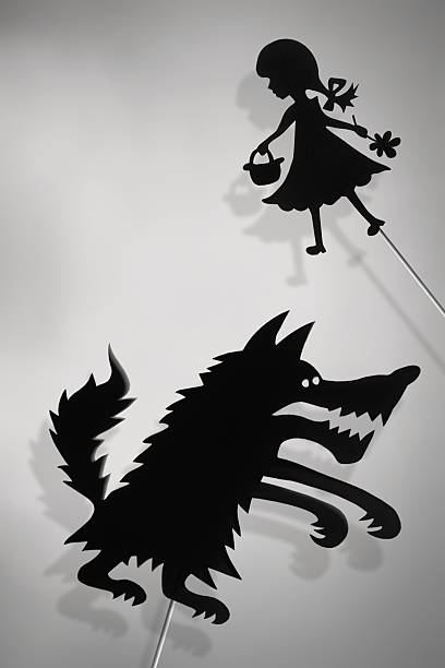 istock Shadow puppets of Red Riding Hood and Wolf 519705156