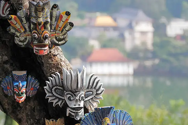 Photo of masks and Dalada Maligawa Kandy temple  view Sri Lanka