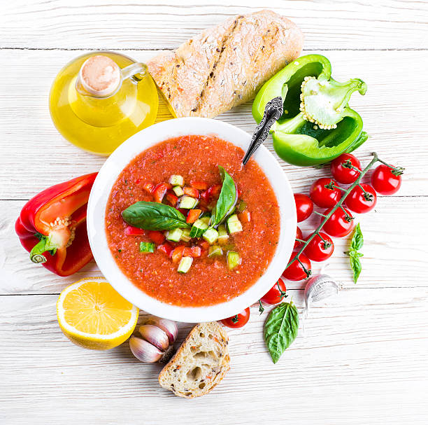 Tomato gazpacho soup with pepper and garlic stock photo