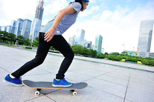 istock skateboarding woman 519706313