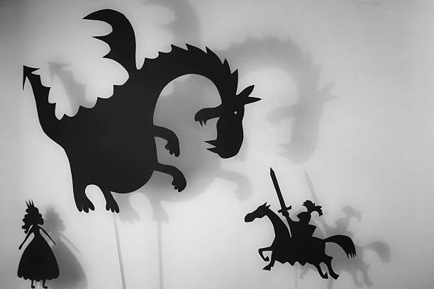 istock Dragon, Princess and Knight shadow puppets 519706682
