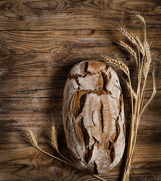 istock Organic loaf of bread, above view 519707808