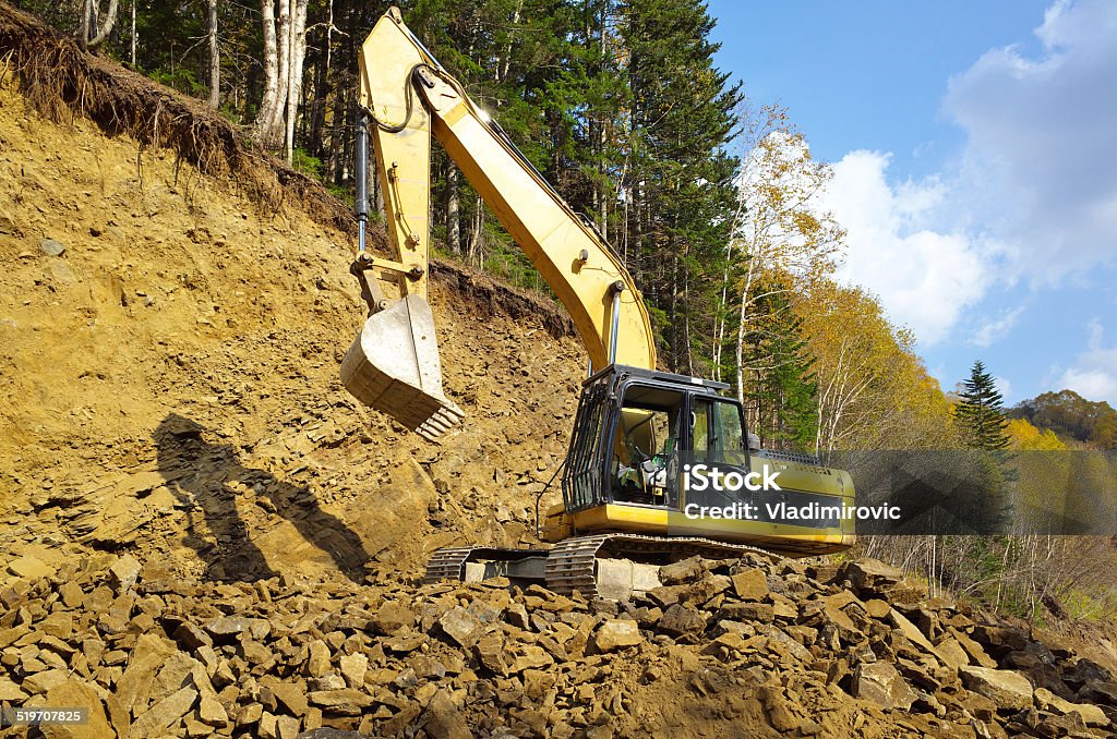 Gelbe excavator Graben - Lizenzfrei Abholzung Stock-Foto