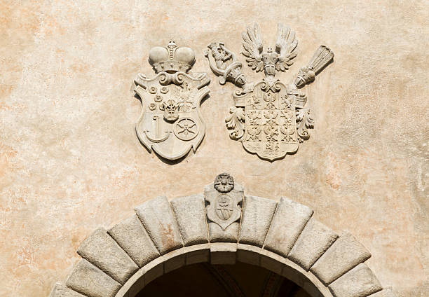 Coat of arm in Cesky Krumlov. Cesky Krumlov is small town on south of Czech Republic. Well known by it's arhitecture. Center of city was added to the UNESCO list of World Heritage Sites. Construction of the town and castle began in the late 13th century.