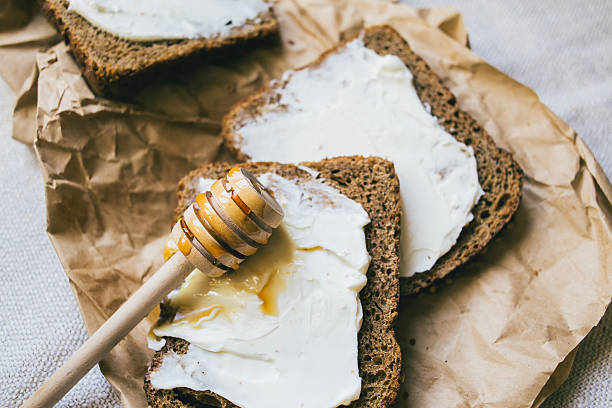 istock Sandwich from rye bread, soft cheese, fresh salad 519711492