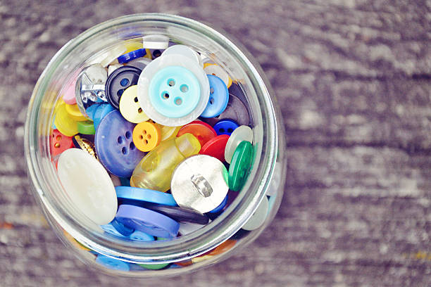 istock Jar of colorful buttons 519715578
