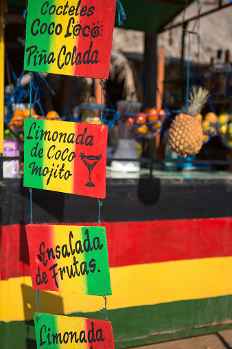 Rasta colours cocktails shop in the street of Taganga, Colombia 2014.