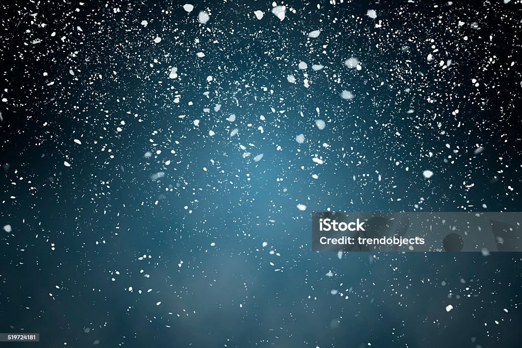 Nevicata con sfondo blu - Foto stock royalty-free di Nevicata