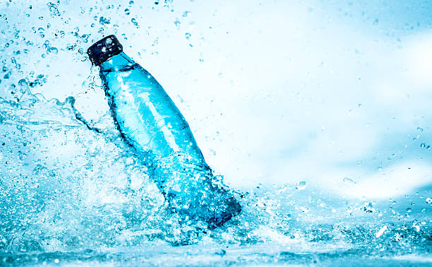 istock Bottle of water splash 519724573