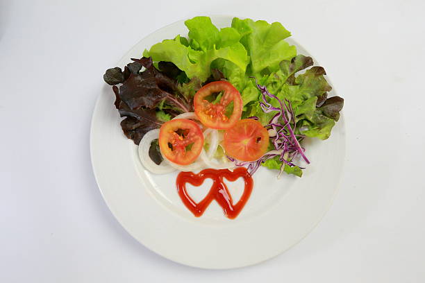istock Heart sauce on the vegetables dish  4 519728125