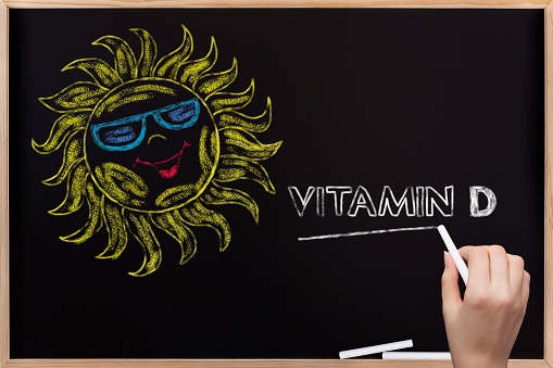 Sun and Vitamin D written on blackboard