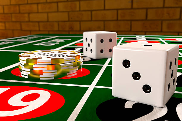 istock tokens and dices on the roulette table 519733338