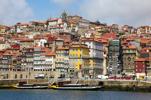 The Ribeira esplanada and the river Douro. Porto is a popular tourist destination in the north of Portugal.