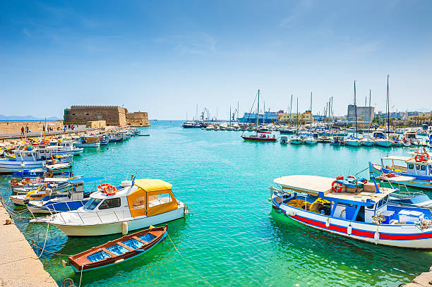 Old port with boats in Heraklion, Crete Old venetian harbor with boats in Heraklion, Crete island, Greece herakleion photos stock pictures, royalty-free photos & images