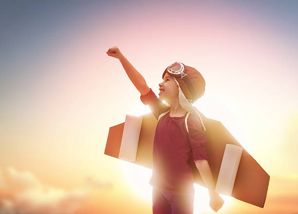 istock girl plays astronaut 519740772