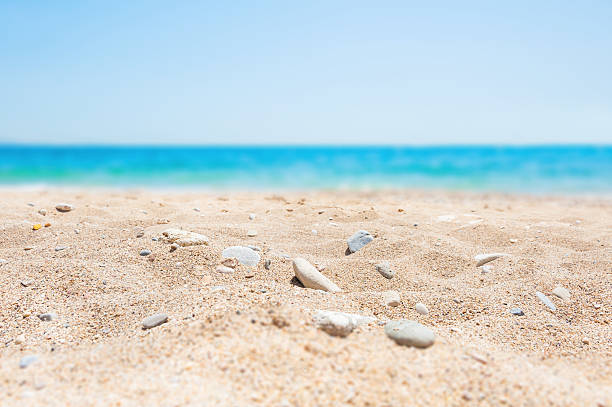 istock Blurred background with white sand and blue sea 519740808