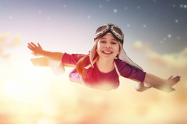 istock girl plays astronaut 519740892