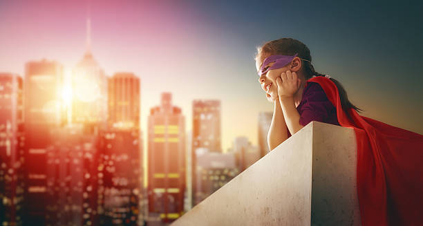 istock girl plays superhero 519741042