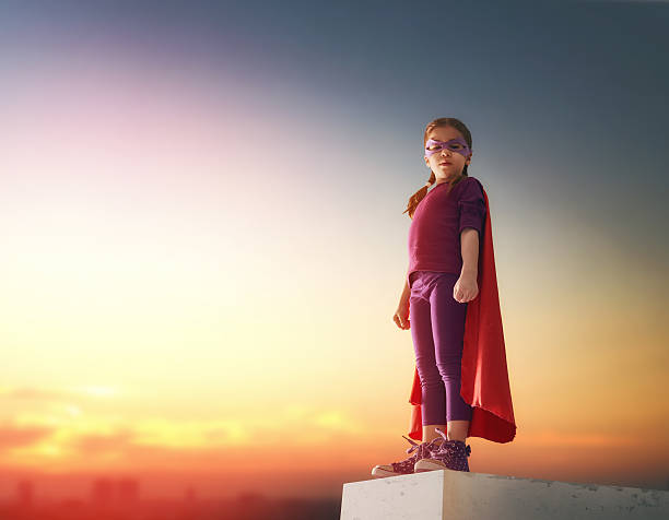 istock girl plays superhero 519746502
