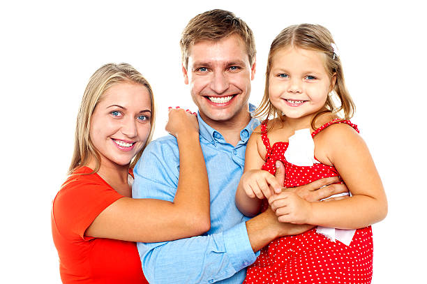 istock Cheerful family of three facing camera and smiling 519746939