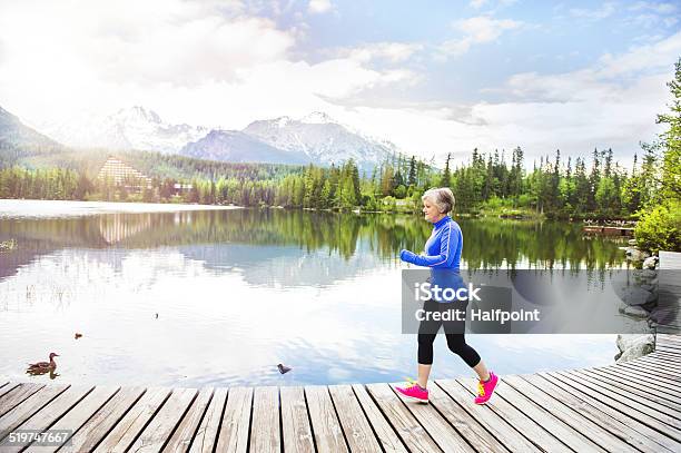 Senior Woman Running Stock Photo - Download Image Now - 60-69 Years, Active Lifestyle, Active Seniors