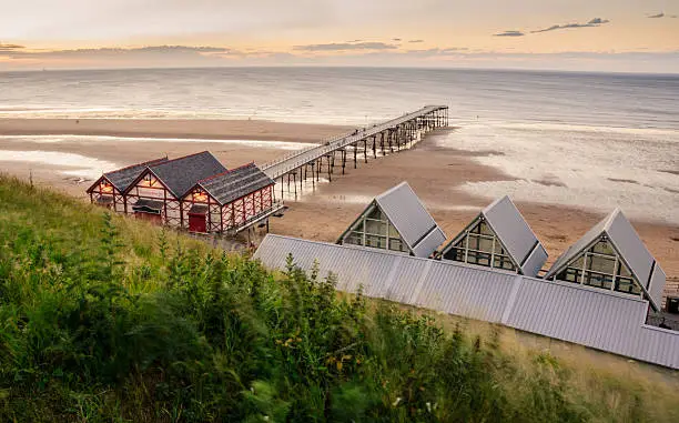 Clifftop view of Pier at sunset time of Saltburn by the Sea