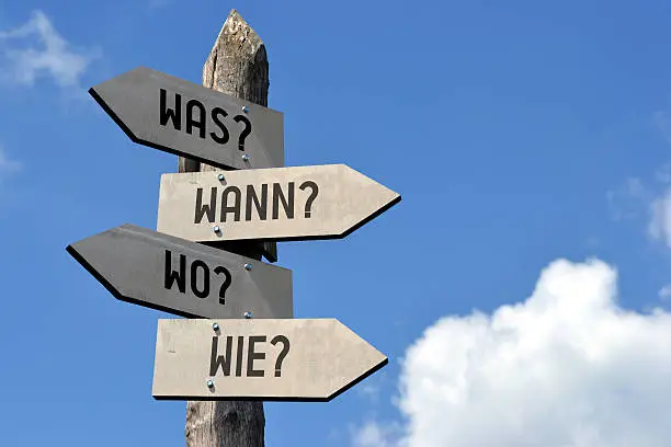 Photo of Questions signpost - in German