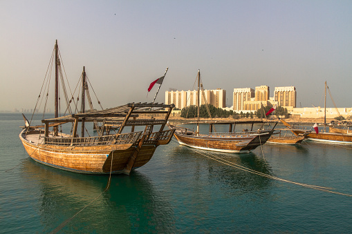 ancient boats mooring at doha bay