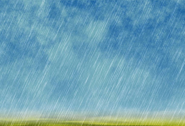 rain storm backgrounds in cloudy weather with green grass stock photo