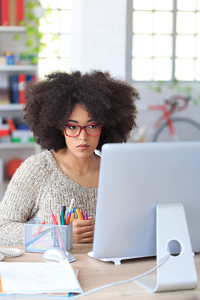 istock Worried businesswoman looking at computer 519752332