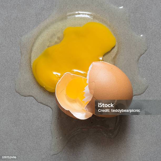 Egg Drop Crack Splattered Down On Ceramic Tile Stock Photo - Download Image Now - Agriculture, Animal, Animal Egg