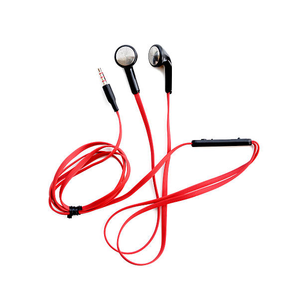 istock Close up on red earbuds isolated on white background 519752538