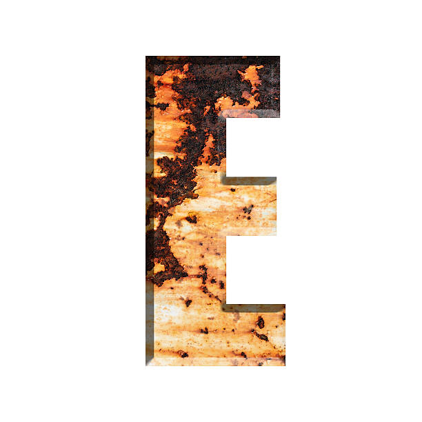 istock Alphabet on Grungy Rusted Steel texture 519754126