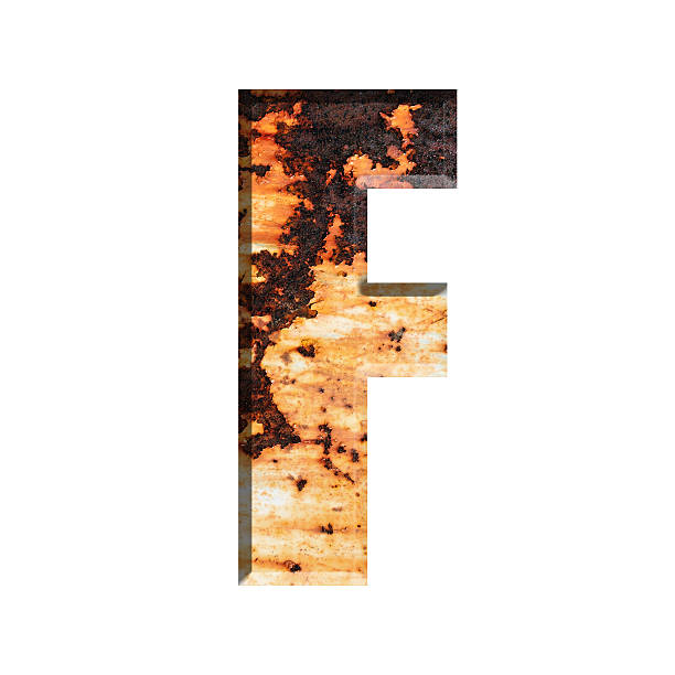 istock Alphabet on Grungy Rusted Steel texture 519754170
