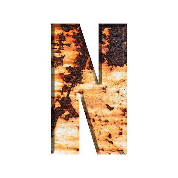 istock Alphabet on Grungy Rusted Steel texture 519754302