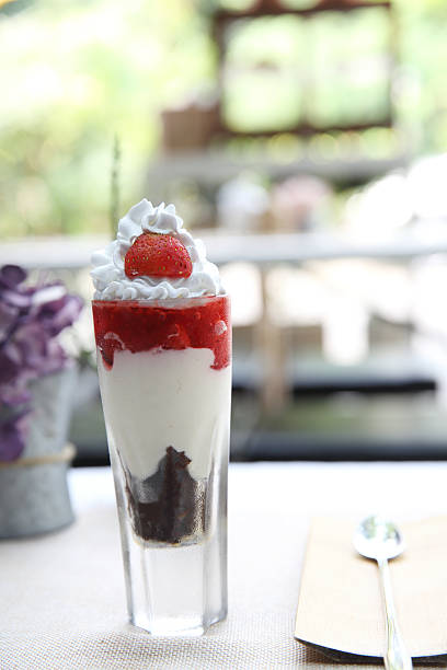 istock Strawberry Parfait yogurt fruit in glass 519757424