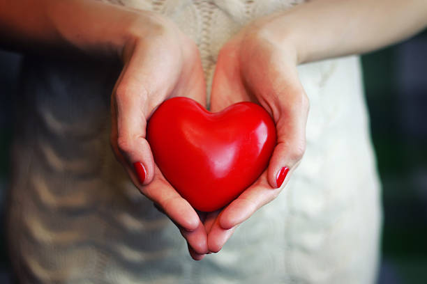 istock female hand valentine heart 519757446