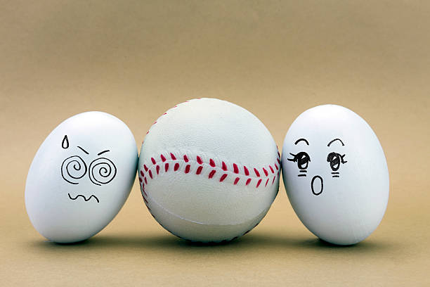 istock two eggs look missed at a baseball ball 519761122