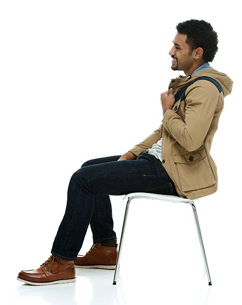 istock Happy man sitting on chair 519761508