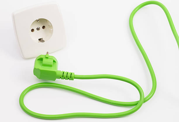 istock Green power plug and outlet 519766515