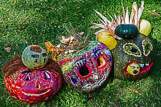 Halloween pumpkins made and painted multicolor by children.