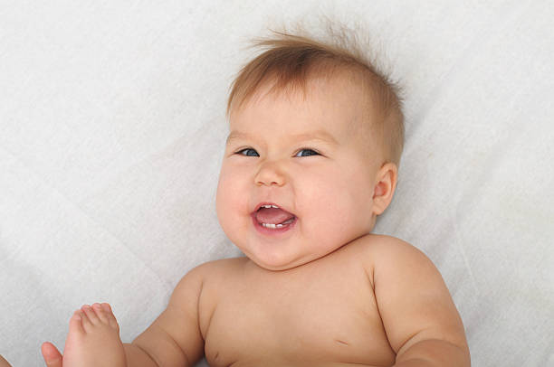 istock Cute happy baby smiling 519769603