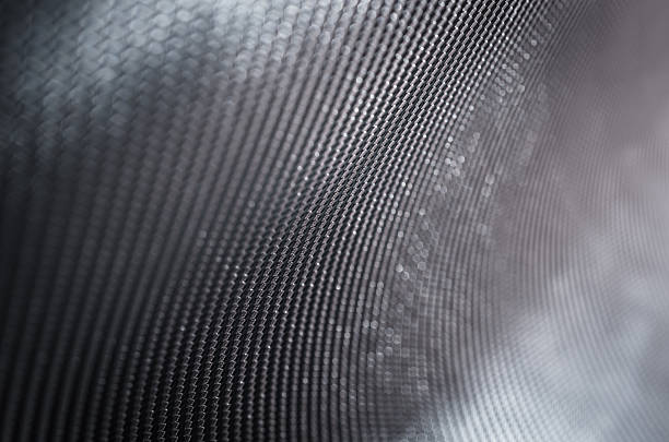istock Abstract dark backgroud shallow depth of field carbon fiber text 519779708