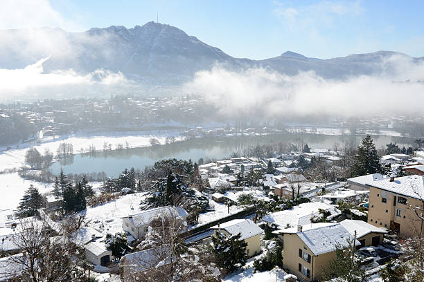 Lake Muzzano near Lugano on winter with snow stock photo