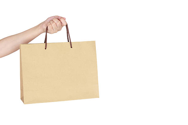 istock Female hand holding shopping bag 519783728